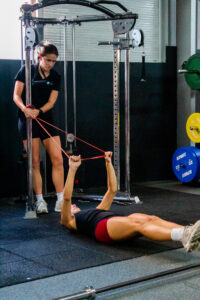 Physiotherapist guiding patient through meniscus tear rehab exercises